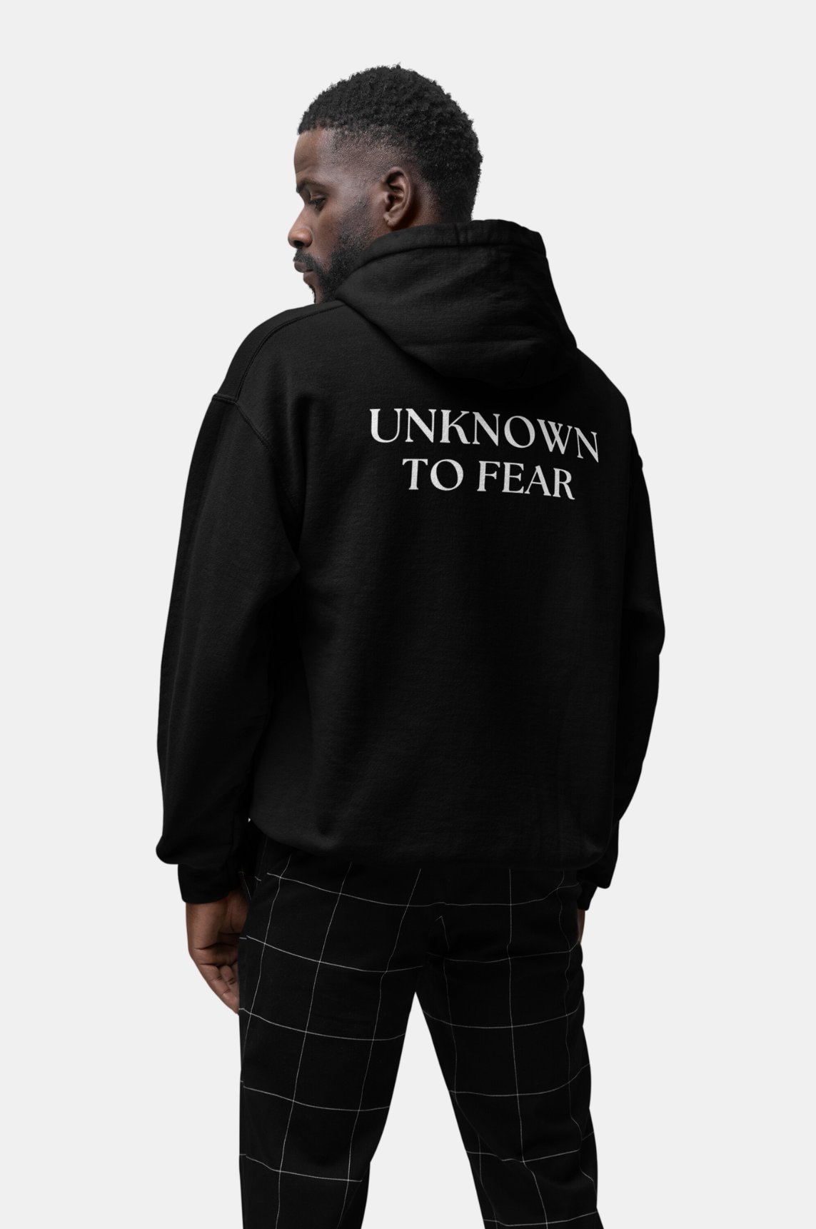 Iconic Emblem Hoodie by Unknown to Fear, Timeless Unknown to Fear hoodie, Classic Unknown to Fear emblem, Color-matched drawcord, Double-lined hood, Rib-knit cuffs, Standout wardrobe piece, Quality Unknown to Fear design, Warm and stylish hoodie, Polished look hoodie