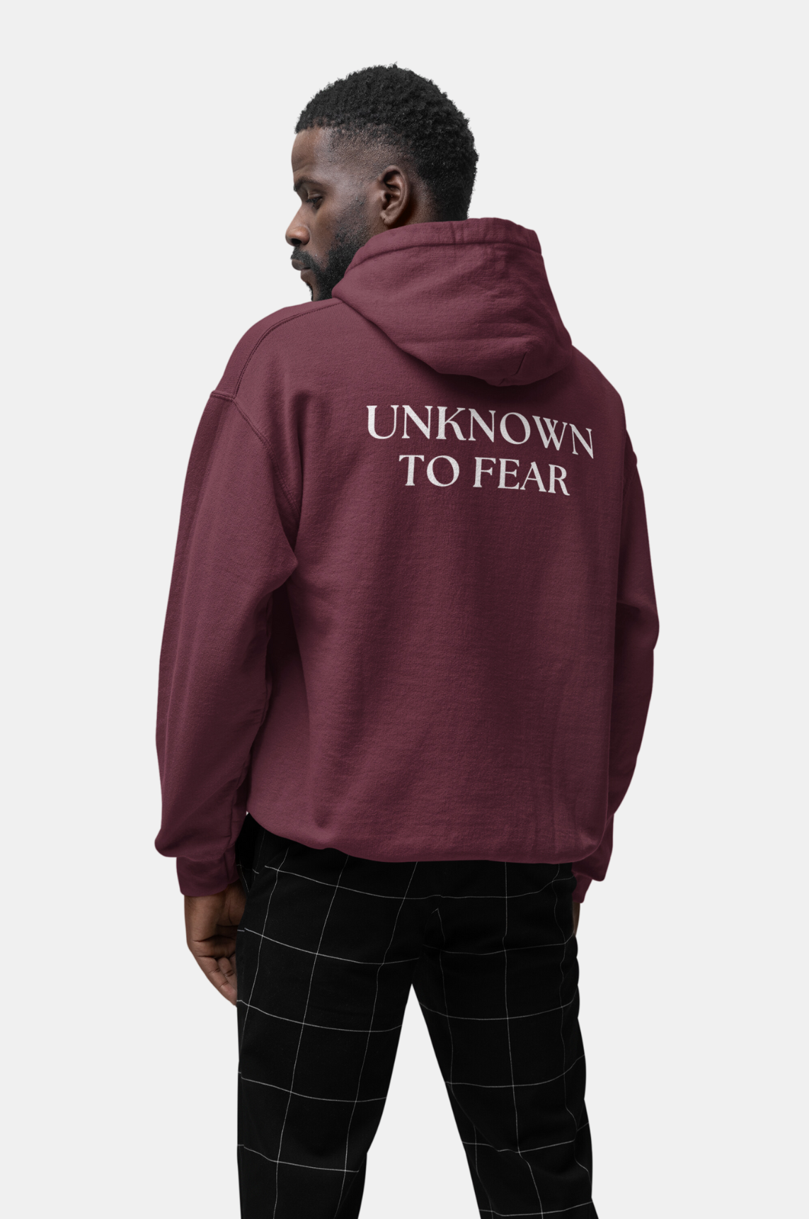 Iconic Emblem Hoodie by Unknown to Fear, Timeless Unknown to Fear hoodie, Classic Unknown to Fear emblem, Color-matched drawcord, Double-lined hood, Rib-knit cuffs, Standout wardrobe piece, Quality Unknown to Fear design, Warm and stylish hoodie, Polished look hoodie