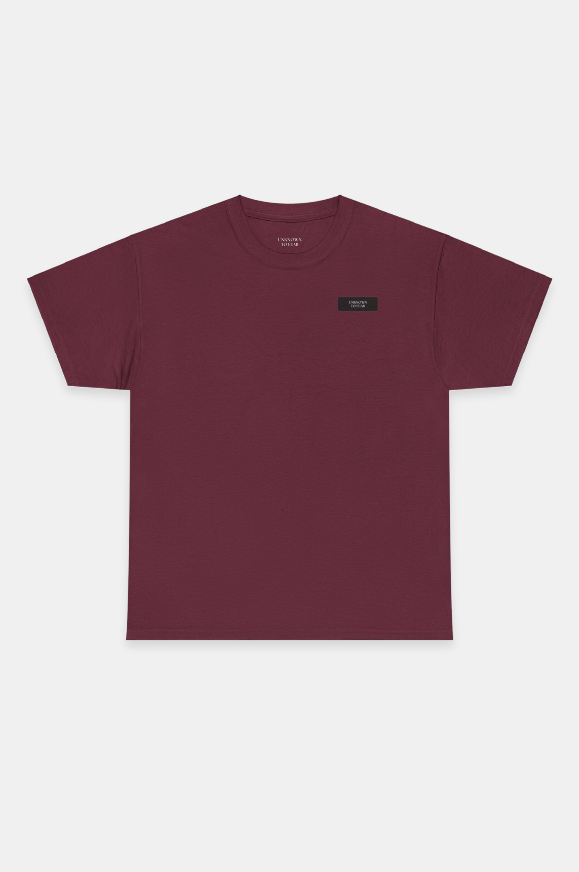  Iconic Emblem T-Shirt by Unknown to Fear, Premium 100% US cotton T-shirt, Distinctive Unknown to Fear emblem, Tailored fit T-shirt, Soft touch comfort, Versatile staple T-shirt, Simplicity and elegance, Timeless design T-shirt, Everyday essential Unknown to Fear, Classic style T-shirt